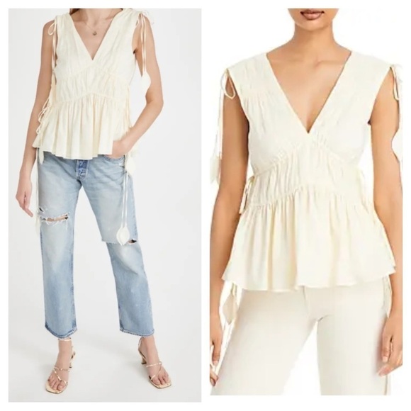 Tory Burch
Sleeveless Smocked Peplum Top COLOR New Ivory size 0 - Picture 5 of 17